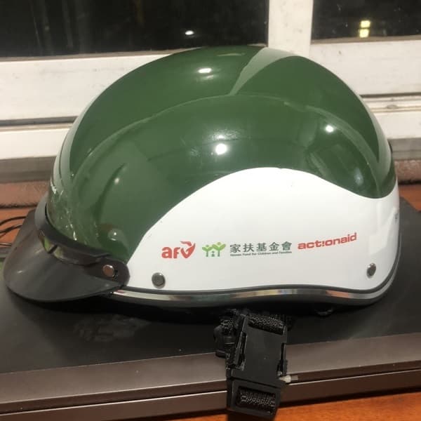 Mũ bảo hiểm in logo ActionAid