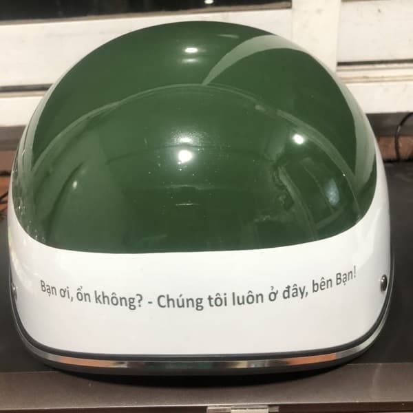 Mũ bảo hiểm in logo ActionAid