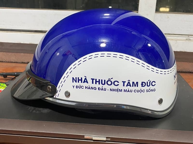 Mũ bảo hiểm in logo nhà thuốc Tâm Đức